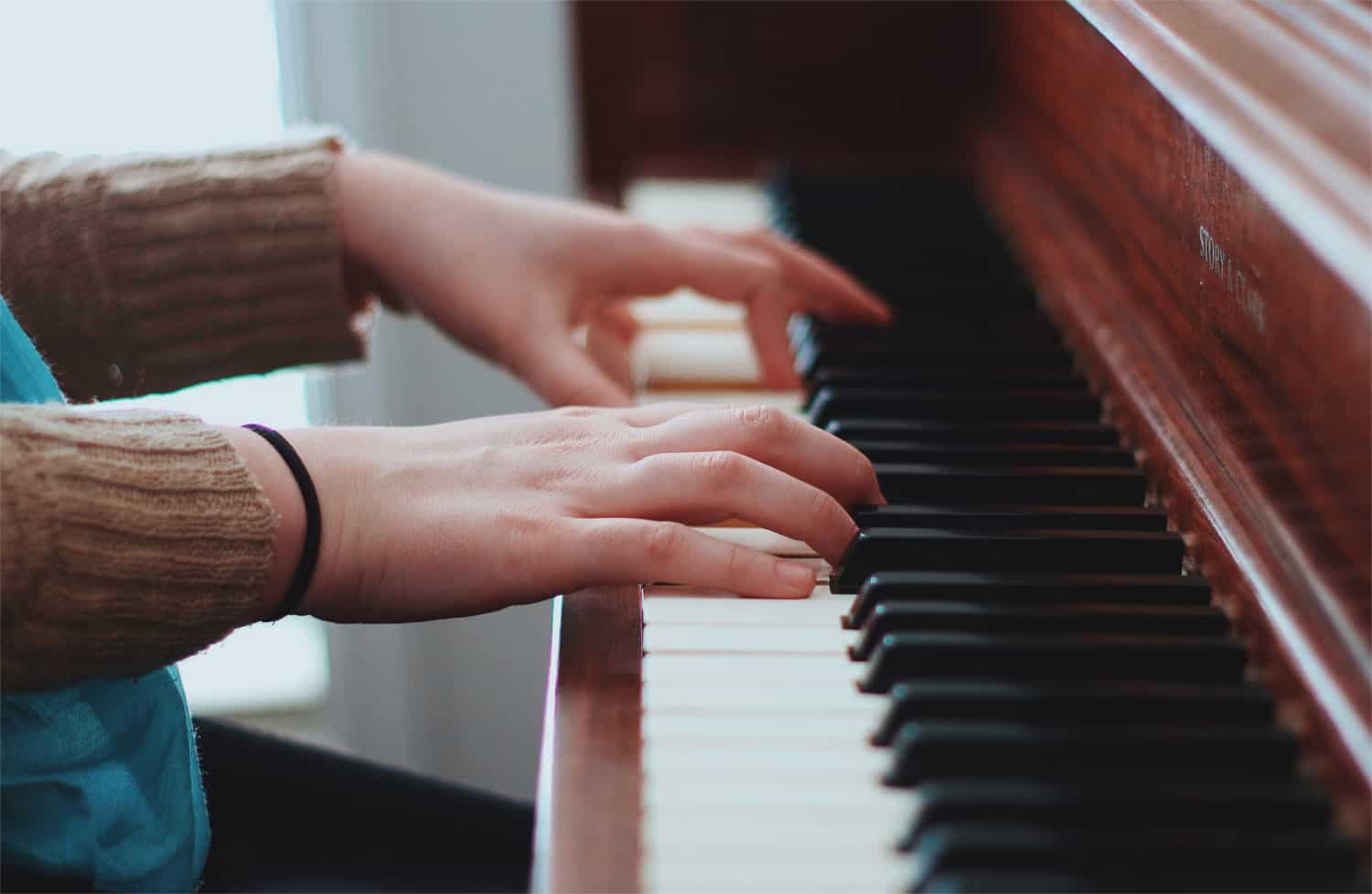 Kids Piano Lessons in Vestavia - Picture a girl playing piano